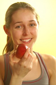 girl-eating-apple-microsoft MP900442468